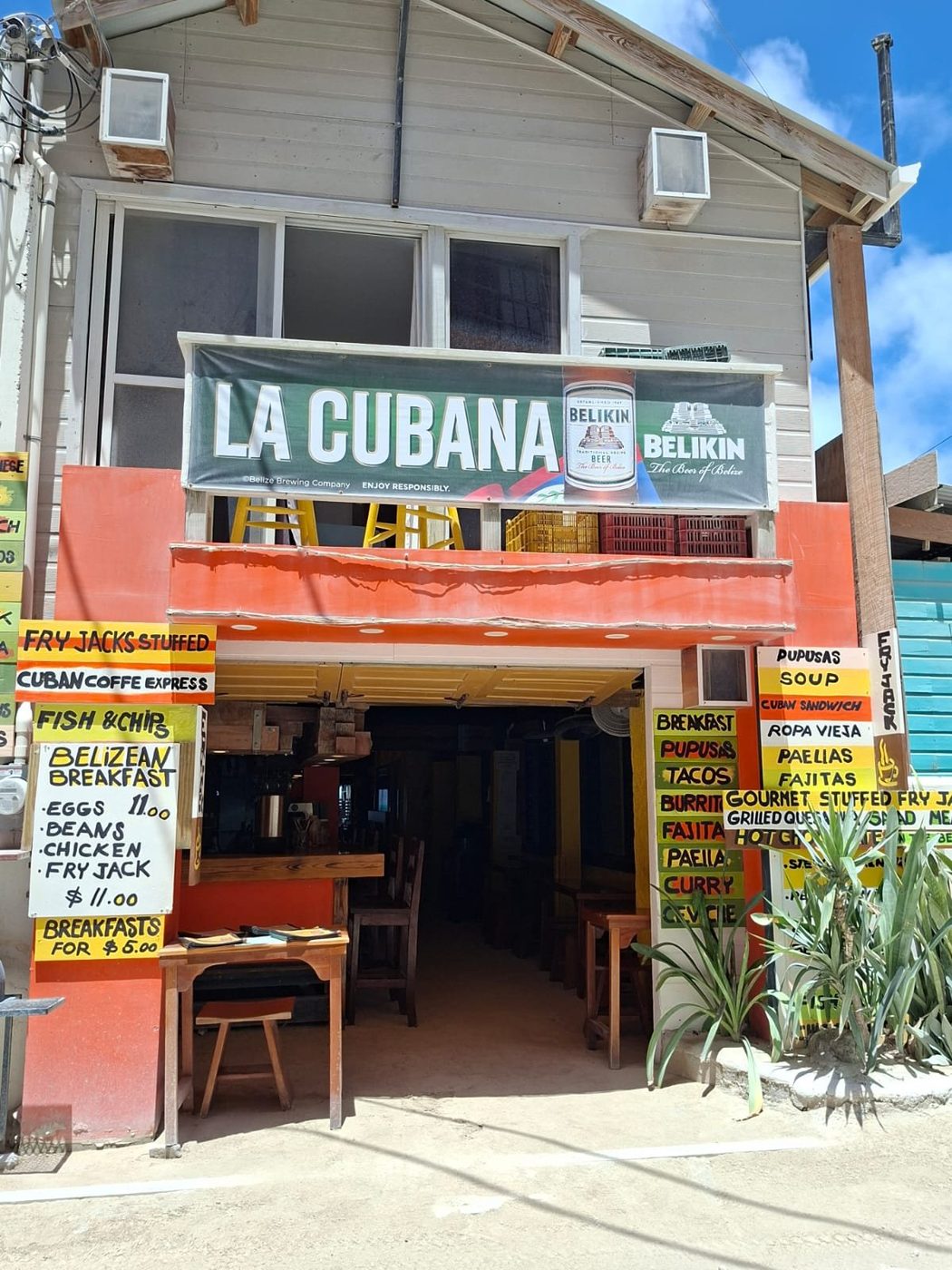 The La Cubana storefront with its Belikin banner on Caye Caulker